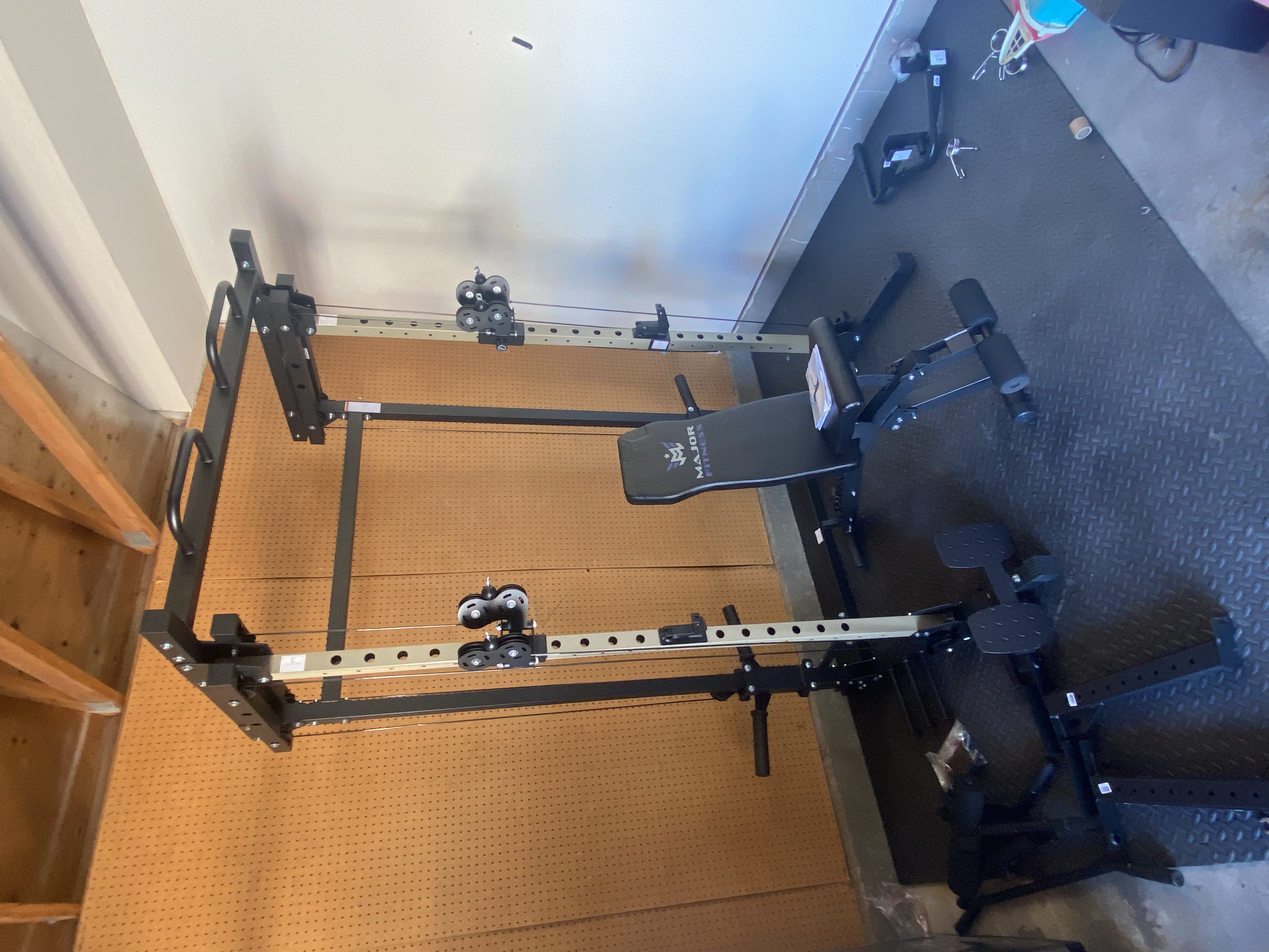 Rack with cable pulleys assembly